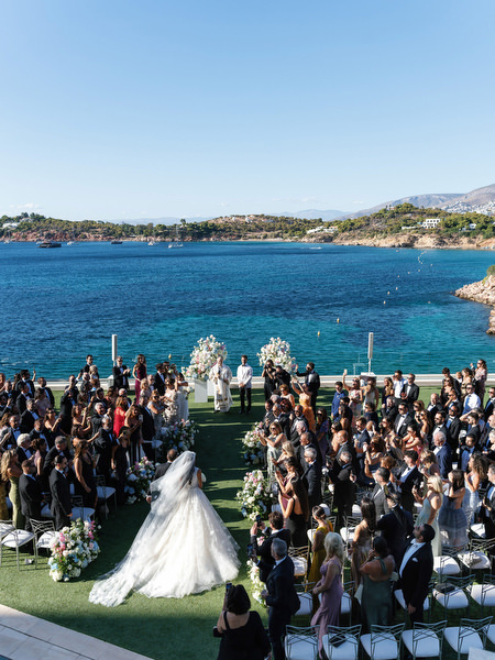 Seaside wedding ceremony overlooking the Aegean Sea at Four Seasons Athens
