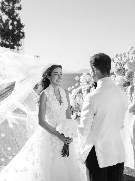 Bride and groom exchanging vows during their outdoor wedding at Four Seasons Athens
