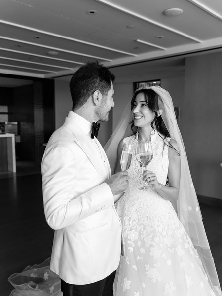 Newlyweds celebrating after their Four Seasons Athens wedding ceremony