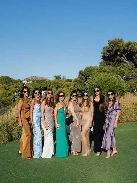 Elegant guests posing at an Athens Riviera wedding celebration