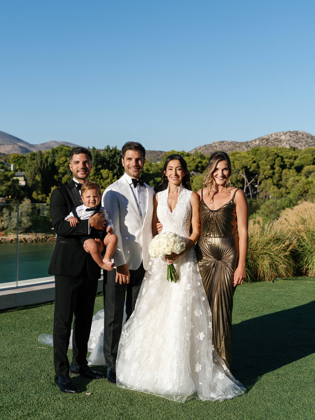 Family portrait at a luxury Athens Riviera wedding celebration