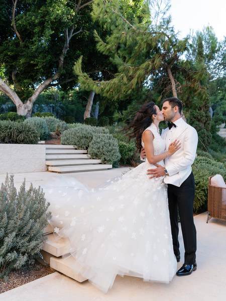 Bride’s gown flowing during sunset portraits at Four Seasons Athens