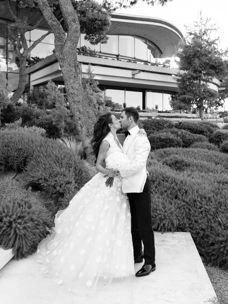 Timeless black-and-white wedding portrait at Four Seasons Astir Palace Athens