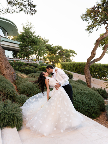 Bride and groom at sunset during their Four Seasons Astir Palace Athens wedding