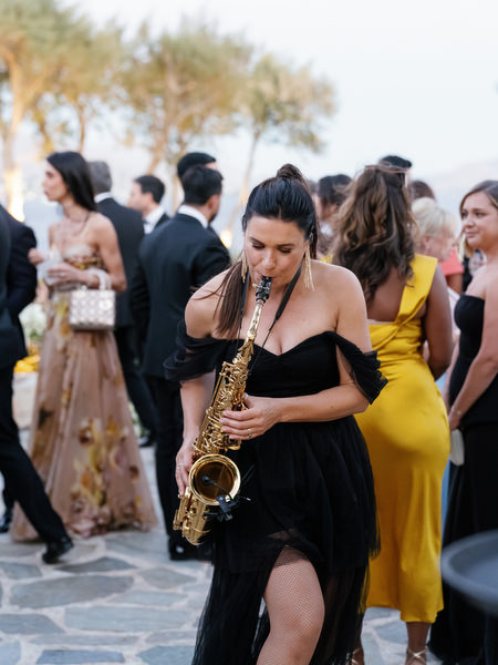 Live saxophone performance at Island Resort Athens wedding reception