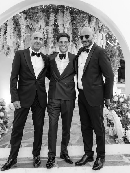 Groom and groomsmen portrait at Athens Riviera destination wedding