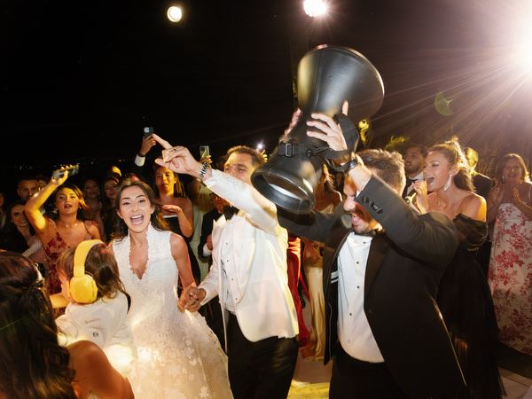 Black-tie seaside wedding reception celebration in Greece