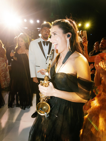Live saxophone performance at Island Resort Athens wedding