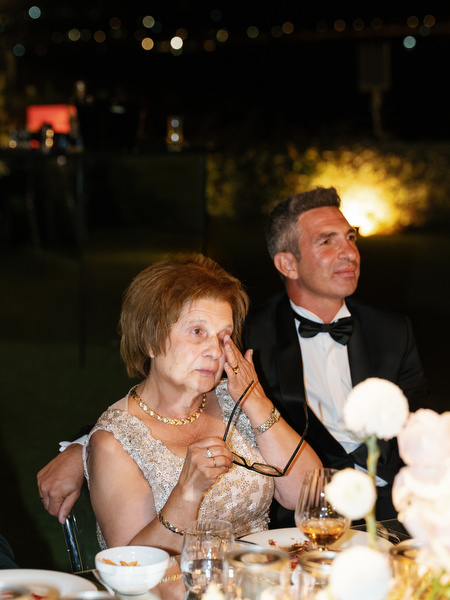 Heartfelt wedding reception moment at Island Resort Athens