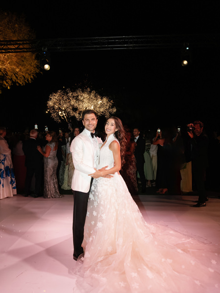 Romantic Athens Riviera wedding celebration at night