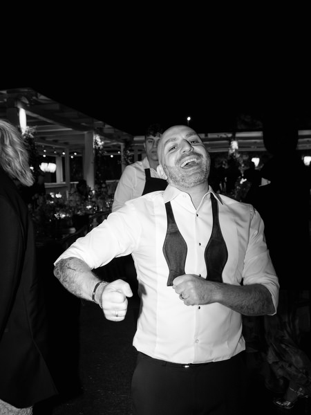Classic black-and-white party moment at Island Athens wedding