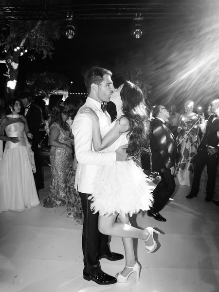 Black-and-white first dance moment at Island Resort Athens Riviera wedding reception