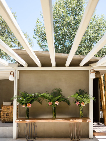 Elegant outdoor bar setup at Reef Athens Riviera wedding venue