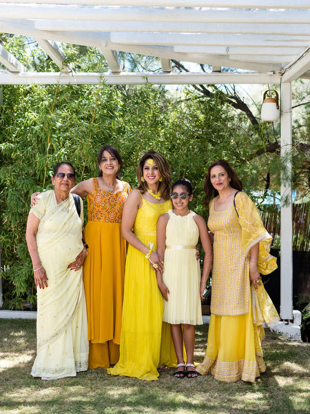 Bridesmaids group in yellow portrait during Indian pre-wedding brunch
