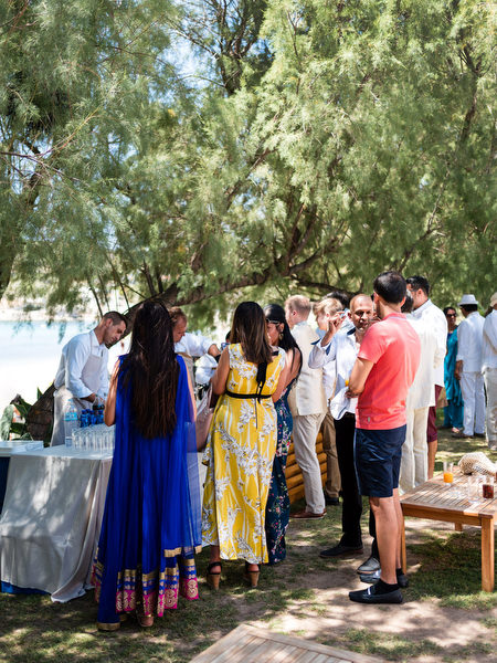 Guests mingling at Reef Athens Riviera wedding celebration