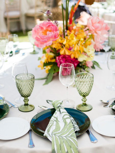 Wedding table detail with colorful floral decor at Indian brunch
