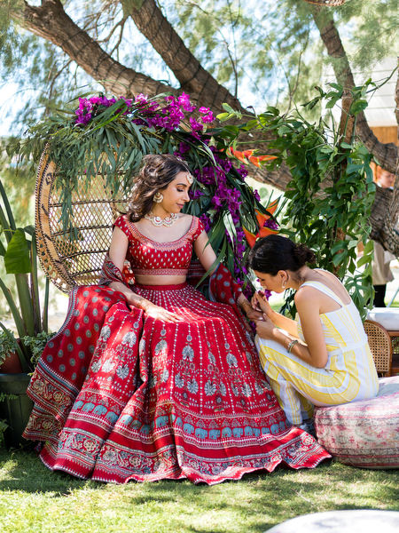 Bride sitting for Mehndi ceremony at Athens Riviera wedding event