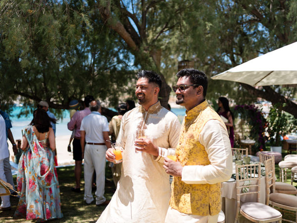 Guests enjoying drinks during Mehndi celebration in Athens