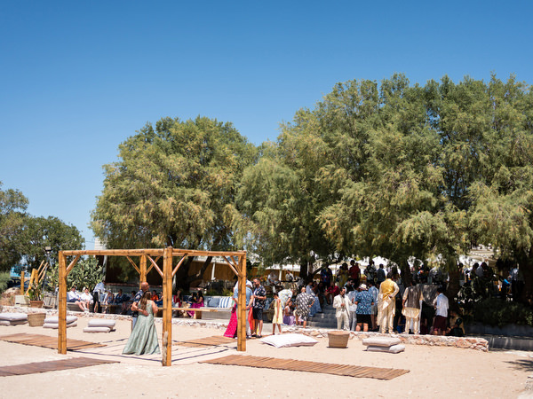 Guests mingling during Mehndi celebration in Athens
