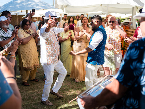Guests sharing joyful moment during Indian wedding brunch
