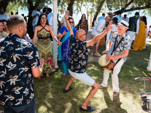 Guests cheering during Mehndi celebration at Reef Athens Riviera