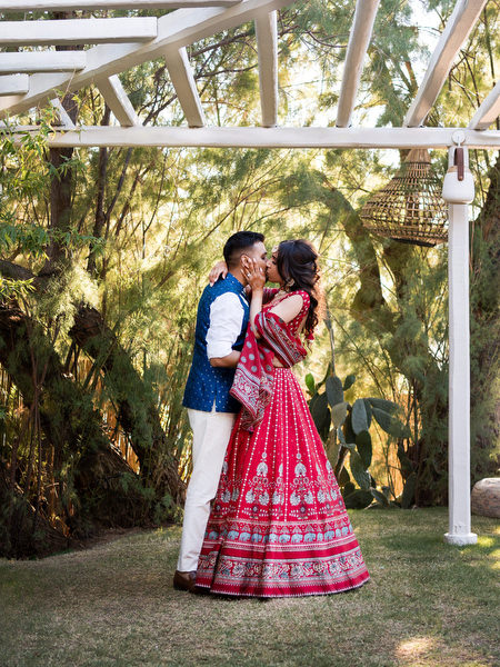 Bride and groom embracing during Indian wedding weekend in Athens