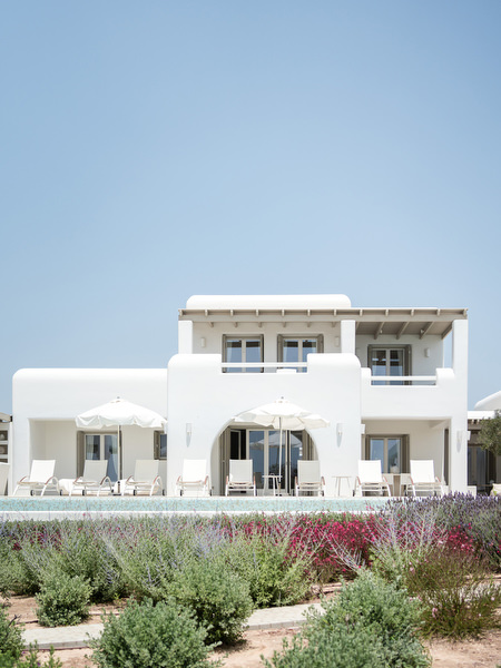 Modern white villa architecture at Petra Farm Paros destination wedding venue.