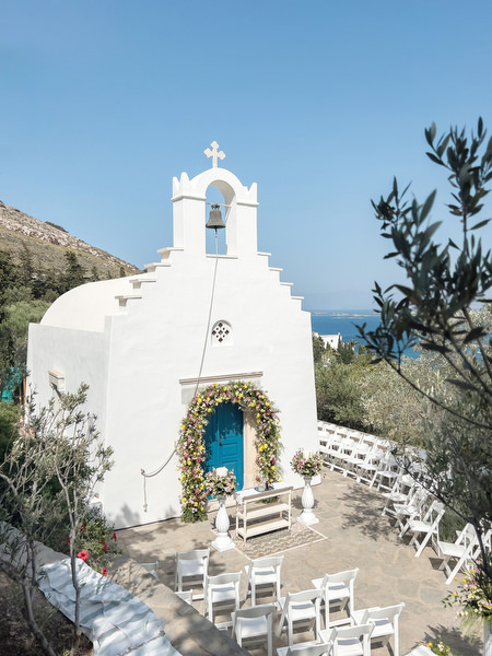 White Orthodox chapel at Petra Farm overlooking the Aegean Sea in Paros.