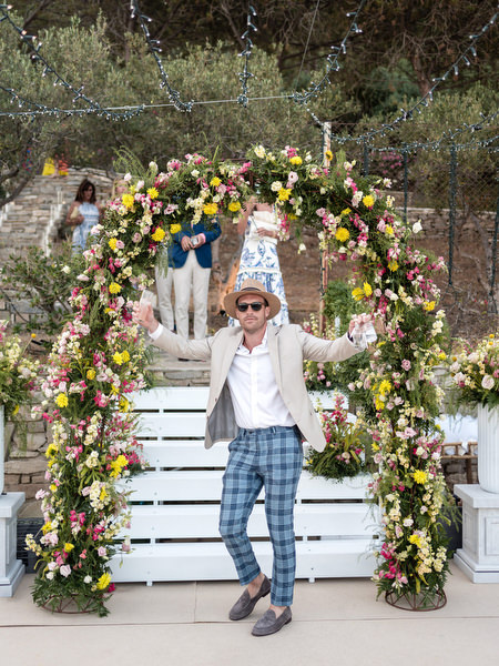 Colorful floral arch used for Paros wedding reception at Petra Farm.