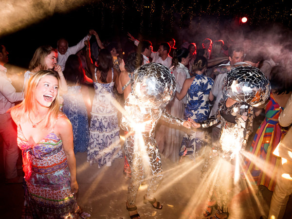 Wedding entertainers dancing at Petra Farm Paros luxury reception.
