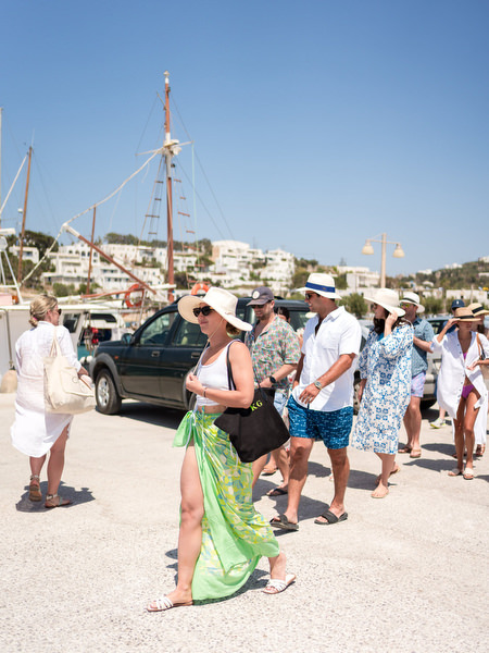 Guests boarding boats during Paros wedding boat day