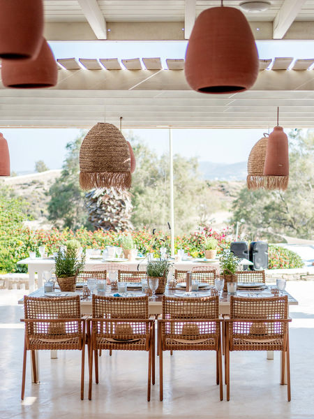 Outdoor reception tables at Monastiri Beach Bar Restaurant in Paros