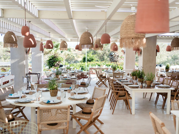 Reception tables decorated for Paros destination wedding welcome event