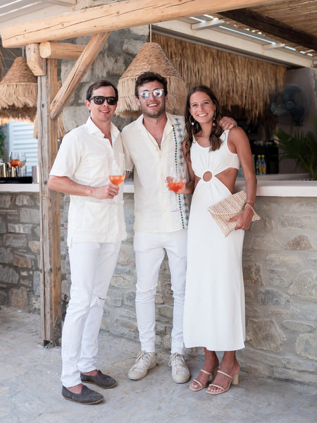 Wedding guests gathered at beachside venue in Paros