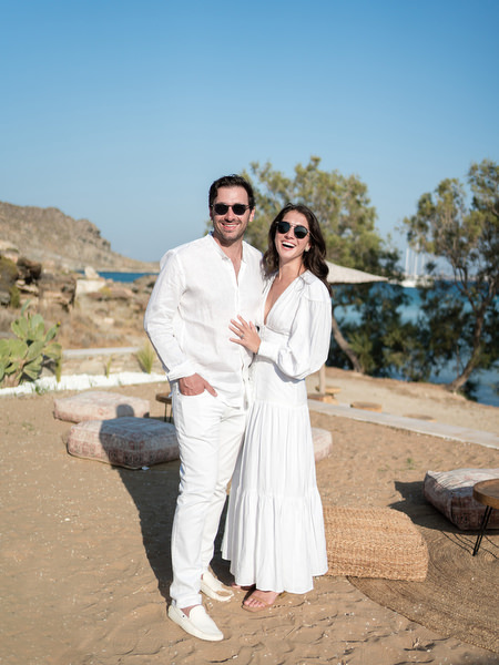 Couple posing outdoors during Paros wedding welcome celebration