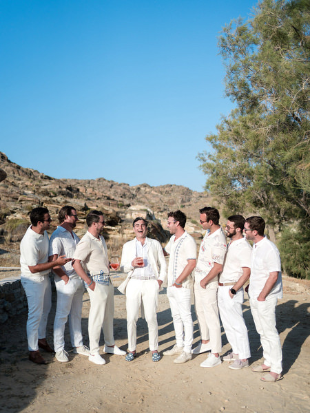 Groomsmen group portrait during Greek island wedding weekend