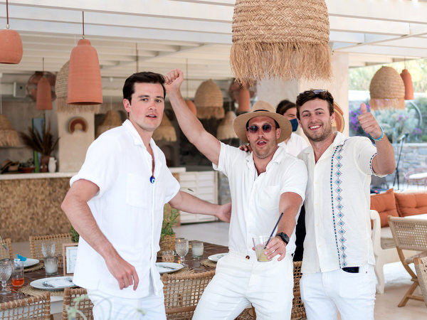 Wedding guests enjoying dancing during Paros welcome party