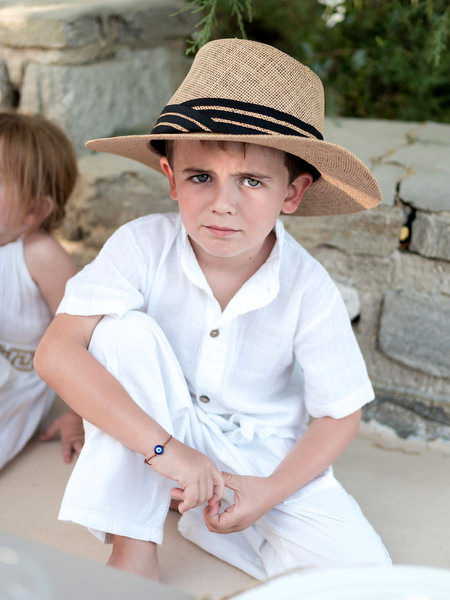 Young guest portrait during Paros wedding welcome party
