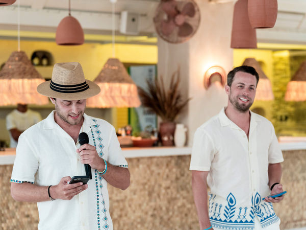 Groomsmen at wedding toast during Paros destination wedding event