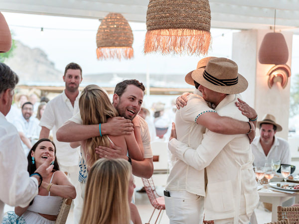 Friends celebrating at Greek island destination wedding