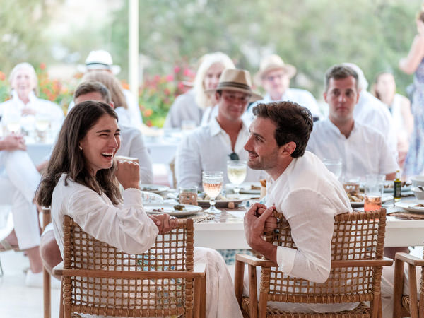 Wedding guests enjoying sunset dinner at Monastiri Beach