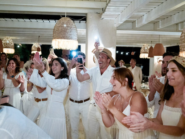 Dance floor celebration during Paros destination wedding