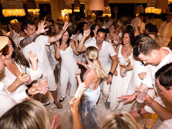 Dance floor celebration during Paros wedding welcome party
