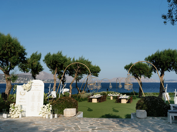 Reception setup overlooking the Athenian Riviera at The Residence Island Resort Athens.