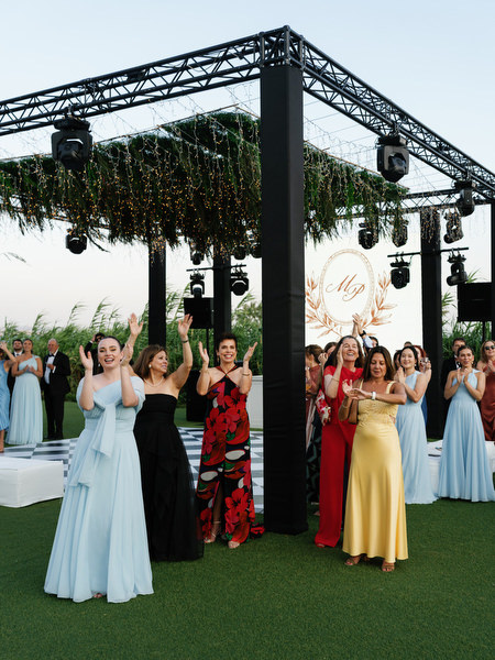 Bride and groom making reception entrance at The Residence Island Resort Athens Riviera wedding.
