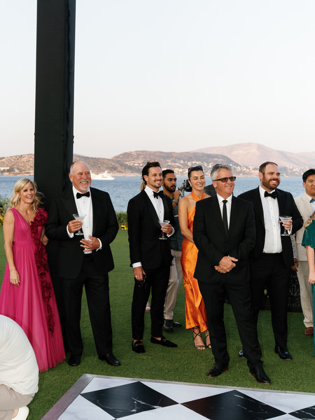 Guests gathered near dance floor during speeches at The Residence Island Resort Athens Riviera.