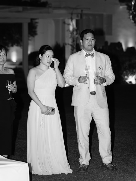 Wedding guests watching first dance at The Residence Island Resort Athens Riviera evening reception.