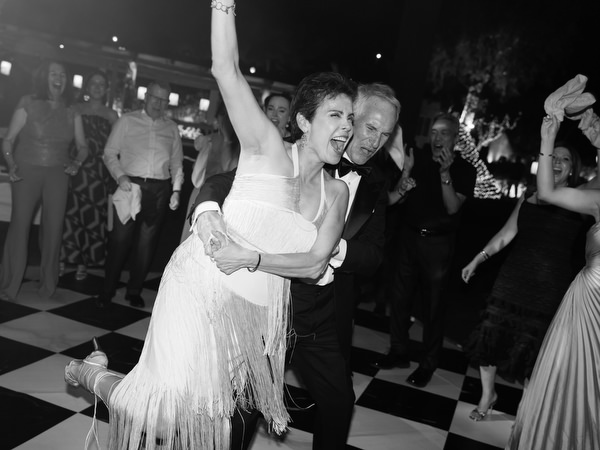 Guests dancing together during late-night party at The Residence Island Resort Athens Riviera.
