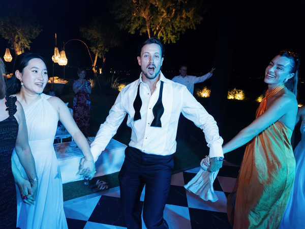 Guest dancing during luxury Athens Riviera wedding reception