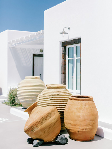 Whitewashed villa details at Eros Santorini wedding morning.